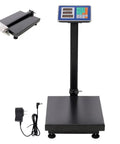 Heavy Duty Shipping Scale With 660 Pound Capacity Foldable Digital Platform showing bright LED display and power adapter.