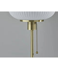 Close-up of pull chain on Hazel Table Lamp in antique brass with frosted ribbed glass shade, mid century modern vibe 22 inch tall