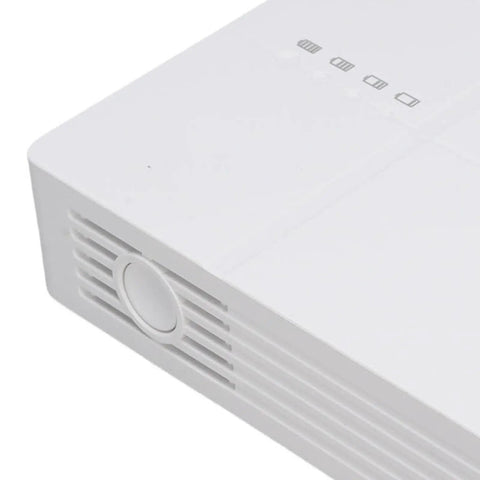 Mini UPS Battery Backup For Security Cameras Routers And Networking Gear Hella Solid Surge Protector close-up of white casing and power button.