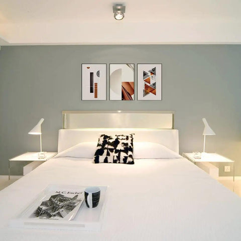 Modern bedroom with abstract art above bed, using Dope No Damage Picture Hanging Kit With 68 Invisible Nails For Concrete Walls.