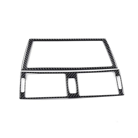Carbon fiber console trim for BMW X5 E70 and X6 E71, focusing on GPS navigation and air vent frame cover.