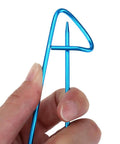 Hand holding a blue aluminum cable needle from 22 Piece Aluminum Cable Needles And Stitch Holders Kit With Safety Pin Cable Stitches Hook