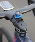 Flat Bar Adapter For Stem And Handlebar Bike Mount made from durable TPU with 3M adhesive on bike stem, close-up view, black