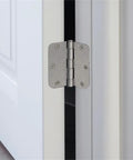 Close-up of 3.5 inch steel hinge in satin nickel finish installed on door, part of Brass Privacy Door Lever And 3 Pack Hinges set.