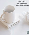 Ultra Smooth Electric Coffee Mug Warmer Usb Powered Cup Heater With Five Level Temp Control Auto Shut Off Compact Base with white mug and heater.