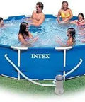 Family enjoying in a 12 Foot By 30 Inch Metal Frame Pool Set With Ultra Tough Liner, Rugged Metal Frame, Included Filter Pump And Setup DVD