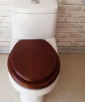Premium Slow Close Toilet Seat Crafted From Solid Wood With Real Bark Veneer on elongated toilet, showcasing rustic finish.