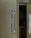 Crystal Glass Rhinestone Cabinet Pulls 4 Pack shiny dresser knobs on wooden cupboard door with 3.8 inch hole centers