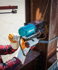 Makita HB350 1-3/8 in magnetic drill; blue tool mounted on steel beam (side view)