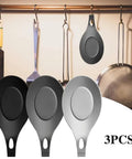 Three Piece Silicone Spoon Rest Set in black, dark grey, and light grey for stove tops and kitchen counters, shown on counter and hanging.