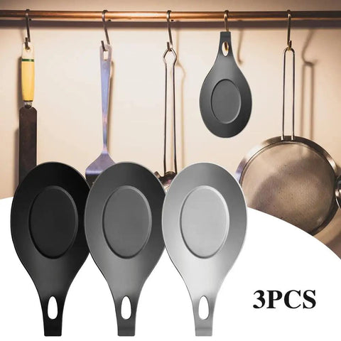 Three Piece Silicone Spoon Rest Set in black, dark grey, and light grey for stove tops and kitchen counters, shown on counter and hanging.