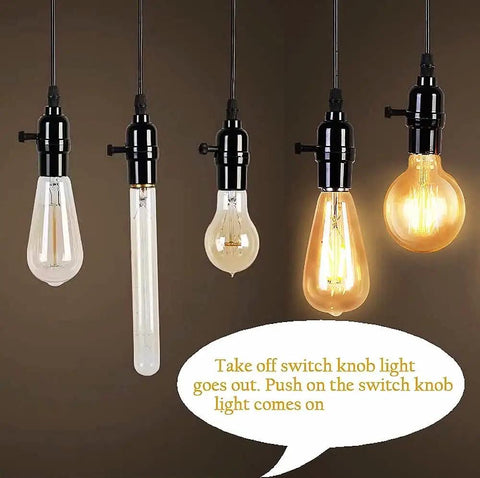 Four hanging lightbulbs with black socket switches, demonstrating Six Pack E26 Lamp Turn Knob On Off Replacement Set In Three Sizes.