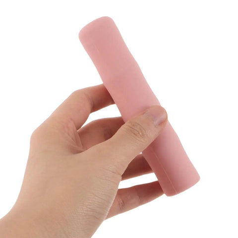 Hand holding pink Silicone Freeze Container Guard Sleeve for Ninja Creami Ice Cream Maker Dust Leak Protection Replacement Part