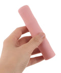 Hand holding pink Two Pack Silicone Ice Cream Maker Sleeves Compatible With Ninja Creami Series Portable Freeze Container Guards