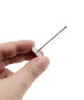 Hand holding a Premium Upholstery Nail with a slick silver flat head, ideal for sofa restorations and DIY projects.