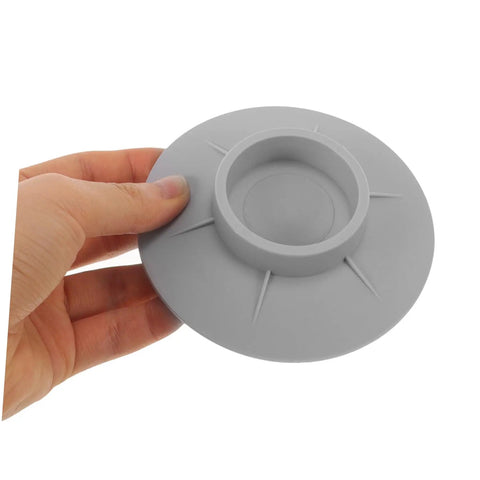 Grey rubber washer pad held in hand showing details, 4 Pack Non Slip Washer Feet Pads With High Friction For Noise Reduction And Vibration Control