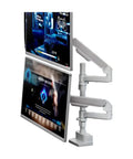 Hella Stable Dual Monitor Mount For Desktop Setup Vertical And Inverted Stand with dual screens and swivel arms in use.