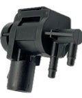 Front view of black plastic DEVMO 4x4 hub-lock vacuum solenoid actuator with dual hose fittings