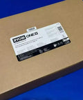 Badass Cordless 18 Volt Brad Nailer With Battery And Charger packaging on blue background, cardboard box with label.