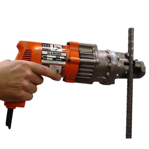 Professional Grade Electric Rebar Cutter Cuts Number 5 Steel Bars With A Hardcore Cold Cutting Shear Setup designed for masonry work.