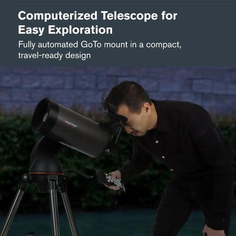 Person using NexStar 127SLT Computerized Telescope With SkyAlign Auto Finder for stargazing, night sky in background.