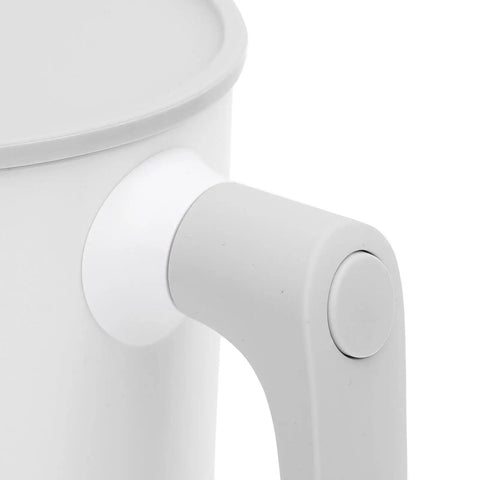 Close-up of the handle and button of the Next Level Smart Mug Warmer And Portable Beverage Cooler with Intelligent Temperature Control.