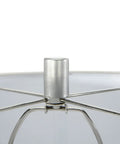 Interior view of Faceted Metal Floor Lamp With Stacked Column Base, Aged Pewter Finish And Cream Linen Drum Shade mechanism.