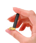 Hand holding Mini Dual Band WiFi Antenna 2.4GHz 5GHz 5.8GHz MIMO RP-SMA Male Right Angle, compact size shown in close-up