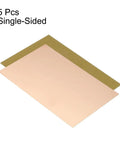 Five Pack FR4 Copper Clad PCB Boards For Prototyping 150 By 100 mm 0.8 mm Thick displayed overlapping on a white background.