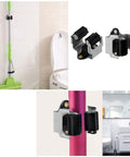 Heavy Duty Wall Mounted Mop Broom Holder Rack Set Of 10 Clips for organizing mops in bathroom, shown with adjustable grip on handle.