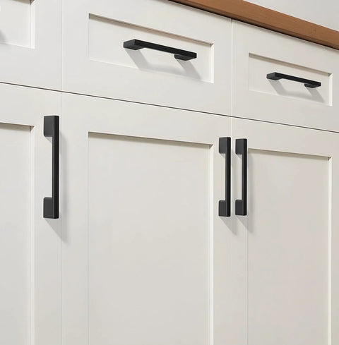 Modern kitchen cabinets with black square handles for smooth operation and coordinated decor