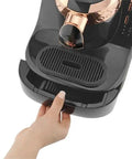 Automatic Turkish Coffee Maker With Self Clean One Touch Brew And Easy Pour Altitude Auto Detect Technology in use, black and silver.