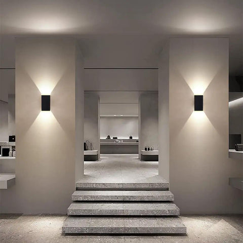 Ultra Sleek 9 Inch LED Rectangle Outdoor Wall Light In Aluminum, Matte Black Finish, illuminating entryway with up-down lighting