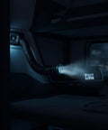Heavy Duty Flexible Air Duct Vent Hose With Integrated Grille Cover installed in a sleeper cab, black corrugated hose cooling air outlet