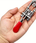 Person holding a Two Pack Self Locking 304 Stainless Steel Toggle Clamp For Quick Press Door Bolts And Box Fixtures Side Mount Hold Down Buckle Clamp Tool Durable Cabinet Door Hardware with red handle
