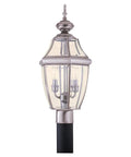 Lancaster Solid Brass Outdoor Post Light In Black, 21.5 Inch Tall, 1 Light Post Lantern with glass panels and detailed finial.