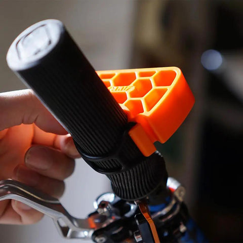 Close-up of Clip On Bike Handlebar Stand Set for inverted parking and bike maintenance on a black bike grip.
