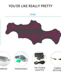You're Really Pretty LED neon sign in pink, 25.6 x 11.81 inches, dimmers, hangable, power adapter, connectors shown.