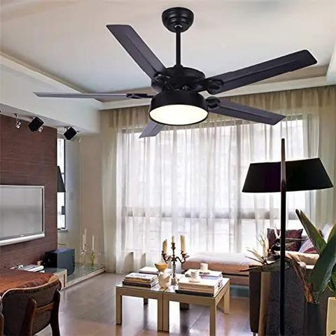 Modern Ceiling Fan With Smooth As Silk Airflow And Top Shelf Led Lighting Kit Includes Wireless Remote Three Chill Tones Bulletproof Iron Blades For Home And Office Decor in living room setting.