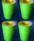 Stacks of Green Masking Tape For Auto Body And Paint Jobs High Adhesion 1 Inch By 55 Meters Flexible Backing Conforms To Curves Clean Removal