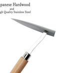 Japanese Garden Triangle Hoe With Stainless Steel Blade And Wood Handle For Weeding And Edging close-up of blade and handle.