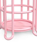 Bottom view of Pink Floor Standing Toilet Paper Holder with Extra Shelf and Back Up Storage Dispenser, showing pink metal base.
