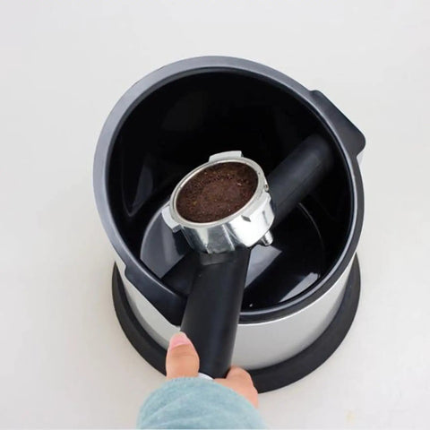 Badass Espresso Knock Box With Detachable Scraper And Shock Absorbent Base 700ML showing full bin with dirty espresso puck.