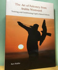Cover of 'Falconry Secrets From Arabia Westward Training And Conditioning Captive Raised Falcons' with silhouette of falconer at sunset