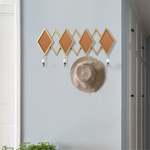 Real Deal Nordic Wrought Iron Wall Hooks For Coats And Keys Heavy Duty Build with decorative diamond design and hat.