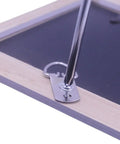 Close-up of Heavy Duty D Ring Picture Hangers With Included Wall Screws, 20 Pack showing installation on a picture frame.