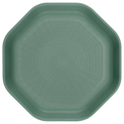 Top view of a green plate from ComplEAT Outdoor Tableware Set For Camping And Hiking, 9-Piece Nestable Polypropylene Dinnerware.