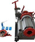 Built Tough Electric Pipe Threader Machine Cuts And Threads Half To Three Inch Steel Pipes With A Muscle Packed Seven Five Zero Watt Motor For Zero Hassle Plumbing Jobs And Rock Solid Job Site Performance viewed from the top with tools and supplies.