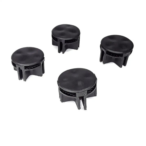 Set of four black ABS connectors from 32 Piece Cube Connector Kit For Plastic Wire Cube Organizer System ABS Connectors For Modular Closet Storage And Wire Shelf Build Black Finish DIY Friendly Easy To Install Fully Adjustable Shelving System For Home Garage And Office, showing round connector tops on white background.