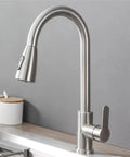 Black Pull Out Deck Mounted Flexible Hot Cold Stream Shower Modes Nozzle Faucet in stainless steel, shown from side angle.